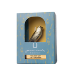 Bird-shaped trophy in a decorative box with 'Jenni Earle' branding.