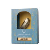 Bird-shaped trophy in a decorative box with 'Jenni Earle' branding.