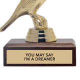 Gold trophy with wooden base and 'You May Say I'm a Dreamer' text