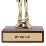Gold trophy with wooden base displaying 'IT'S GO TIME' on a white background