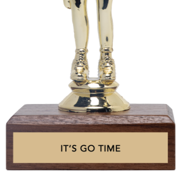Gold trophy with wooden base displaying 'IT'S GO TIME' on a white background