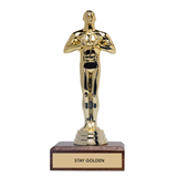 Gold trophy figure with 'Stay Golden' base on a white background