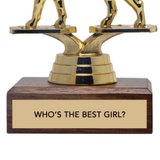 Gold trophy with wooden base and 'WHO'S THE BEST GIRL?' text