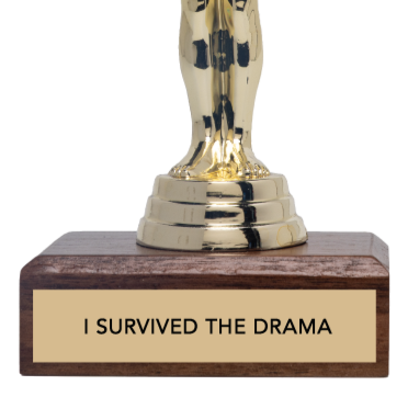 Gold trophy figure with 'I Survived The Drama' base on a white background