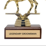 Gold horse and rider trophy with wooden base and 'Legendary Groomsman' text on a white background